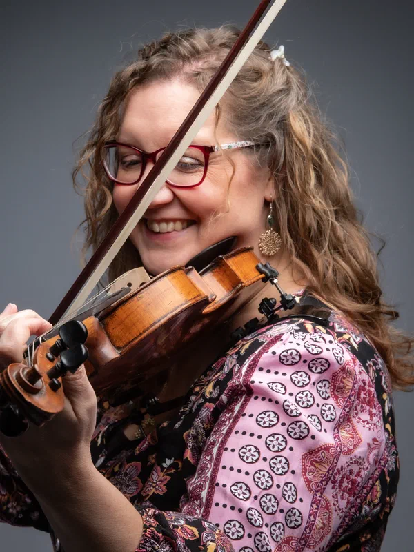 Close-up of Sarah playing her 300-year-old violin