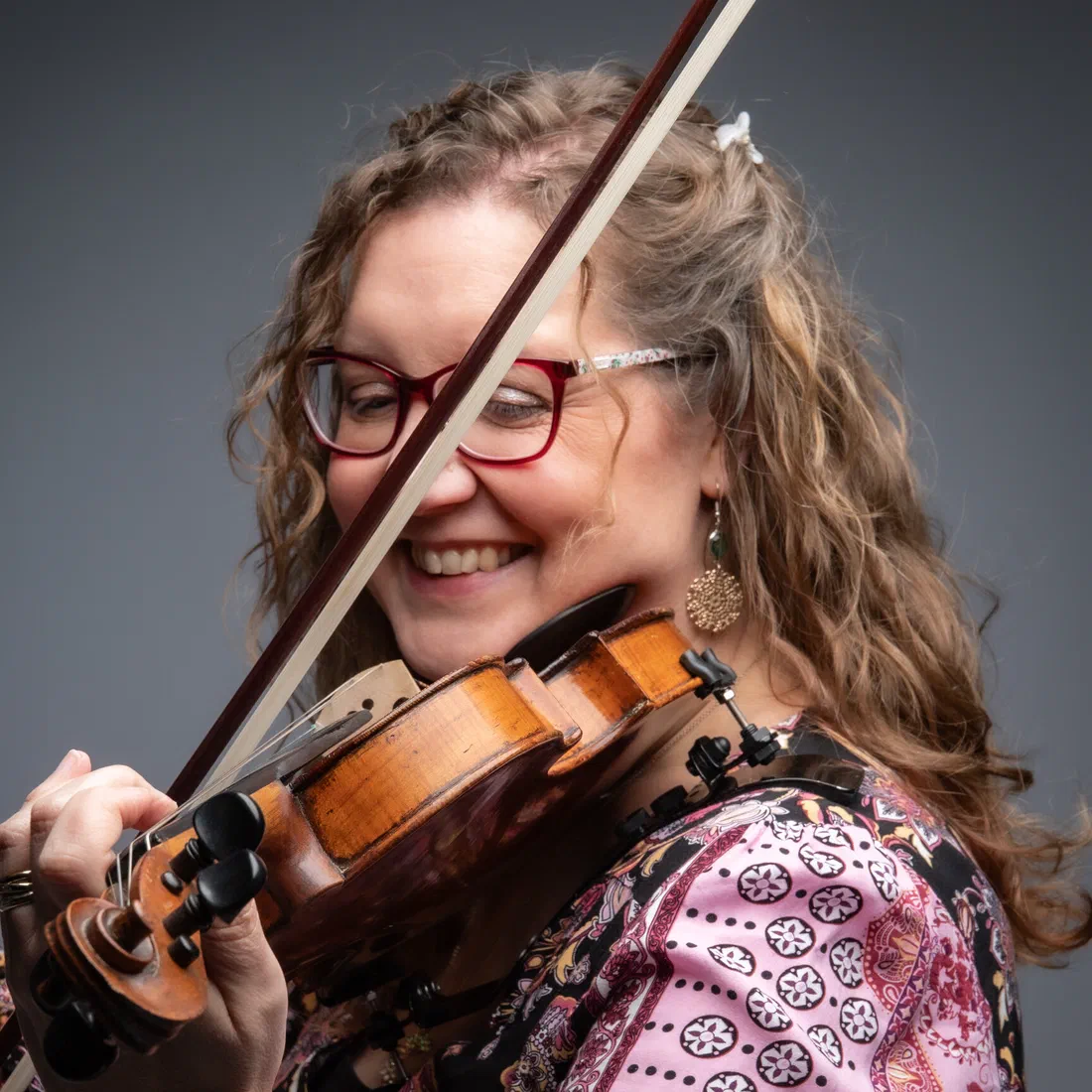 Close-up of Sarah playing her 300-year-old violin